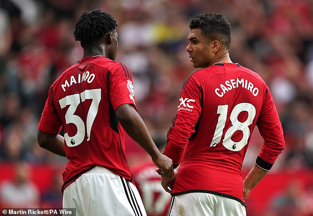 He is moved into United's starting midfield as a replacement for Casemiro (right)