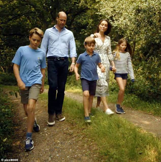 The family walks through a woodland area in Norfolk during Kate's recent video