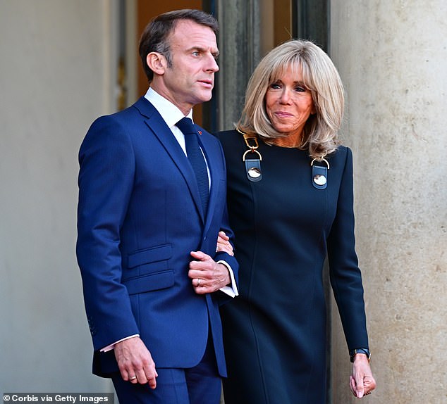 It had become known that Emmanuel Macron's wife, 46, [pictured together] wore her own clothes 'without any specific instructions being given to her' by the series known for its fashion