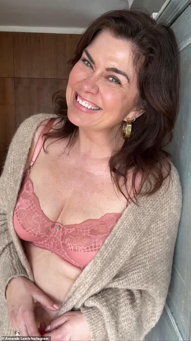 Amanda exuded confidence as she showed off her beautiful features in pink lingerie