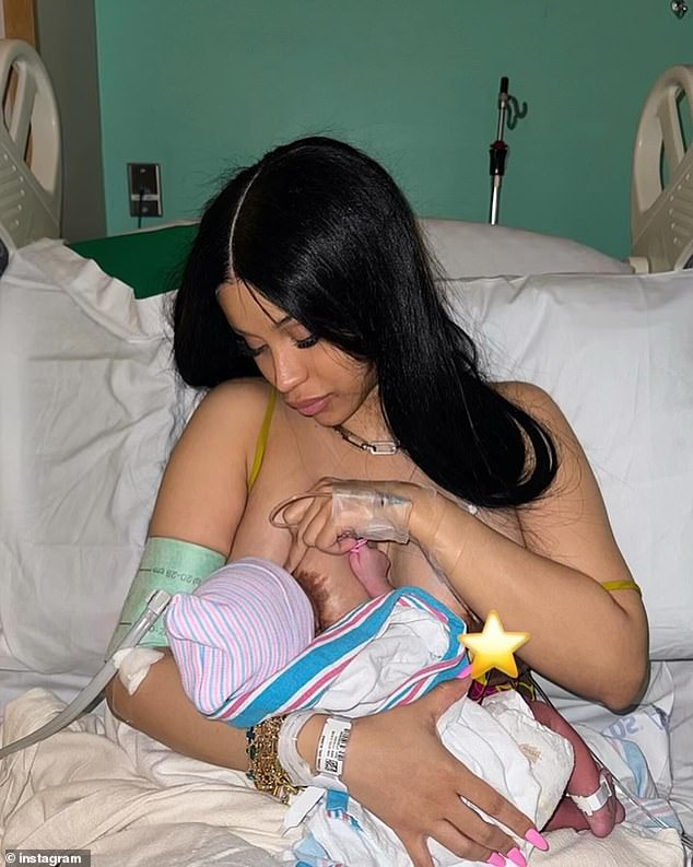 Cardi was a devoted new mother as she breastfed her baby girl