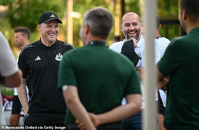 Mitchell pictured joining Howe and the player for pre-season training in Germany