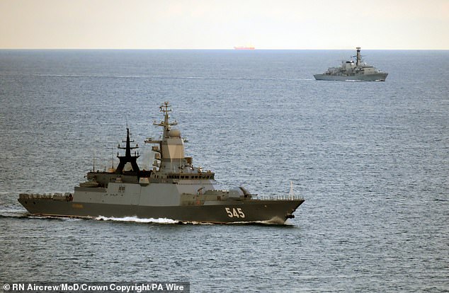 HMS Iron Duke (right rear) follows the Russian Navy Steregushchiy-class corvette RFS Stoiky