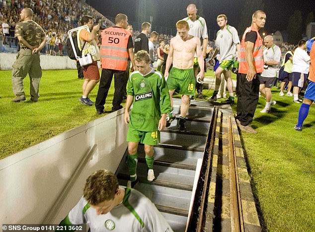 Celtic players leave after 5-0 defeat to Slovakians Artmedia in 2005