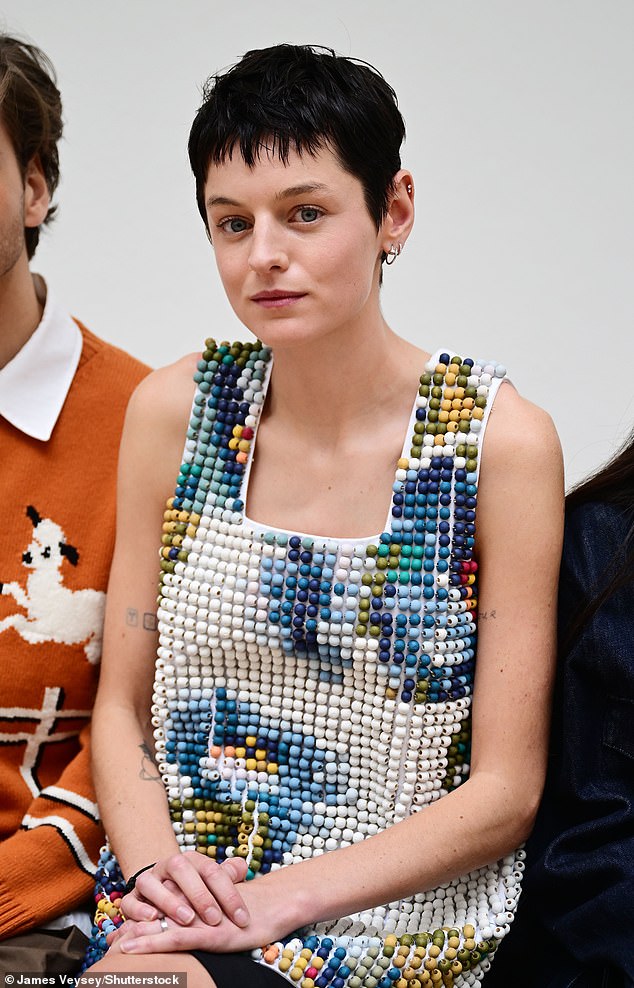 Emma's stylish ensemble featured thick shoulder straps, a square neckline and was embellished with hand-painted wooden beads that formed pixelated floral prints