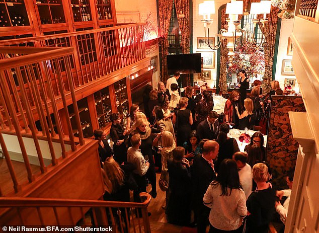 The dining experience was one of refinement - mirrored walls, a red-gold ambiance and handmade floral arrangements added to the old-world atmosphere