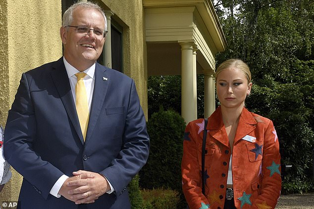 Grace Tame (pictured right) shot to fame when she was pictured giving then Prime Minister Scott Morrison (pictured left) a 'sideways glance'. 