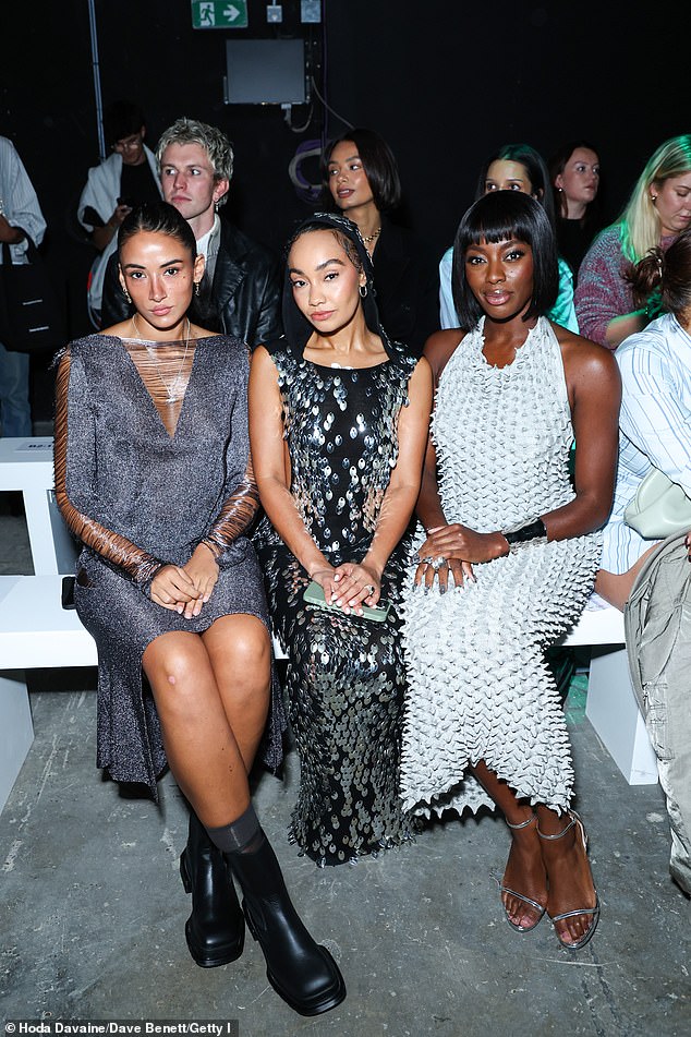 Leigh-Anne and AJ were photographed looking as glamorous as ever in the front row, shoulder-to-shoulder with Vivienne Westwood's granddaughter and model Cora Corré