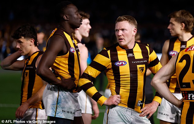 Hawks captain James Sicily hit back at Port Adelaide coach, defending his young teammate Jack Ginnivan