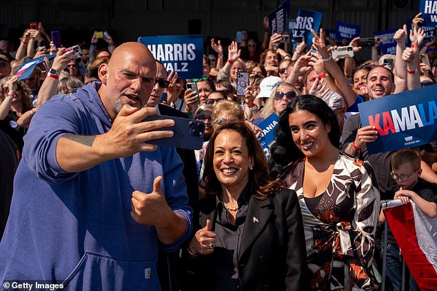 Vice President Kamala Harris (center) stopped in Johnstown Friday afternoon and was greeted by Sen. John Fetterman (left) and his wife, Gisele (right). The Harris campaign has studied Fetterman's 2022 campaign and hopes to emulate it in 2024