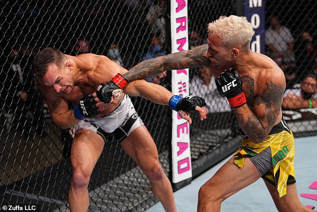 Oliveira defeated Chandler via knockout for the vacant UFC lightweight title in December 2021