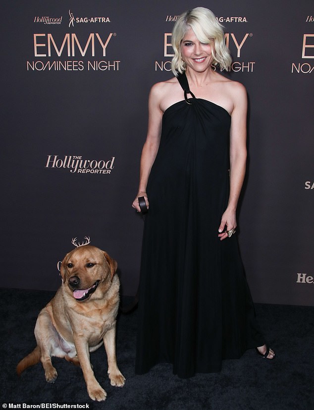 Selma Blair was also in attendance, resplendent in a flowing black dress held up by a thick strap wrapped around her right shoulder