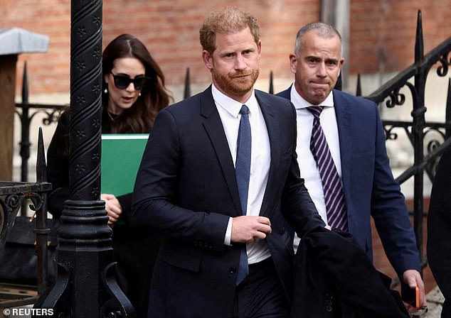 David Langdown pictured with Prince Harry in London in March 2023. He is believed to work primarily from California