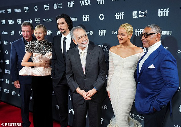 Pictured: Coppola poses with the cast of Megalopolis