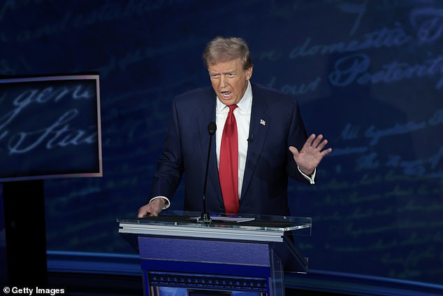 The post went national, even making it onto the debate stage, where Republican candidate Donald Trump (pictured at the debate) claimed the rumor as fact, despite moderators saying officials had found no evidence. The debate was broadcast to 67 million people