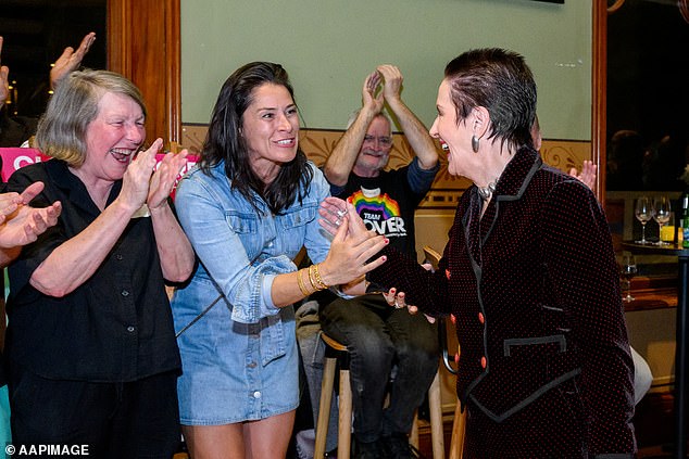 Clover Moore is pictured partying with supporters at the Arthouse hotel in Sydney's CBD on Saturday night