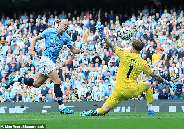 The striker then went through on goal and tapped the ball over the keeper to put his team ahead