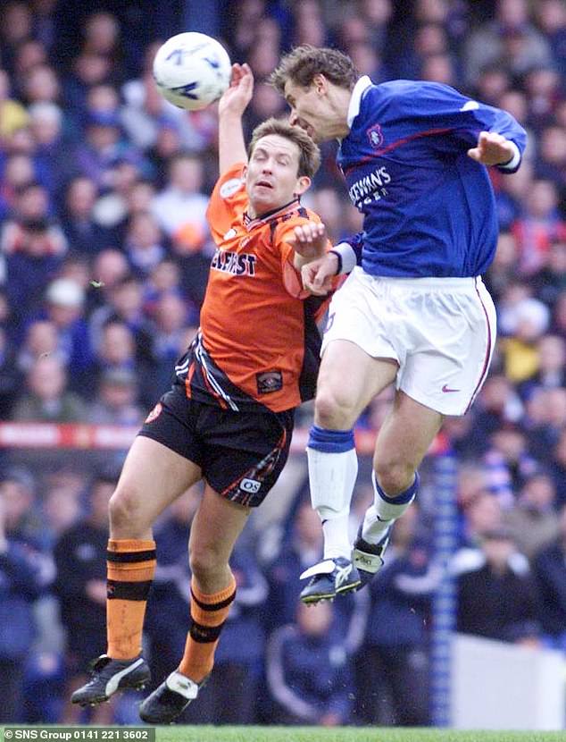 Dodds battles with Andriy Kanchelskis and was a regular nuisance during the game against Rangers