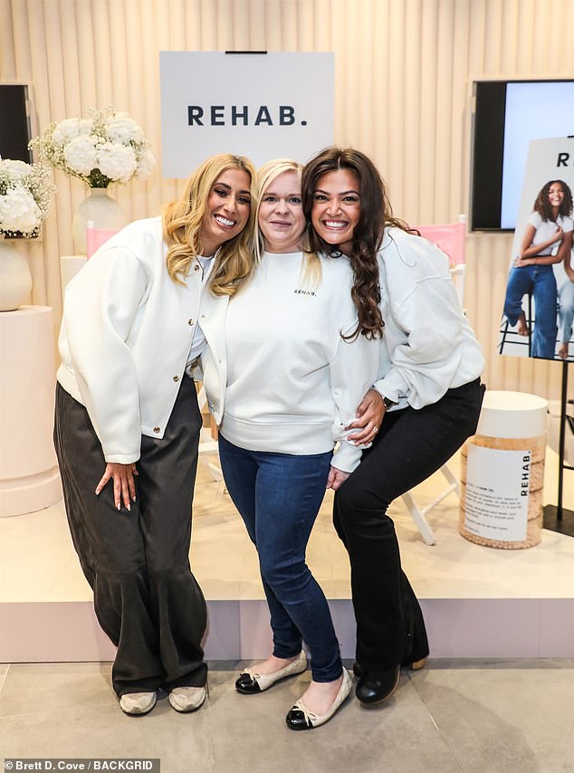 The former XFactor star beamed with happiness, visibly excited about the triumphant event, as she stopped to pose for a series of beaming snaps with REHAB co-founders Anastasia Muca & Vicky Ellis (pictured with Stacey)