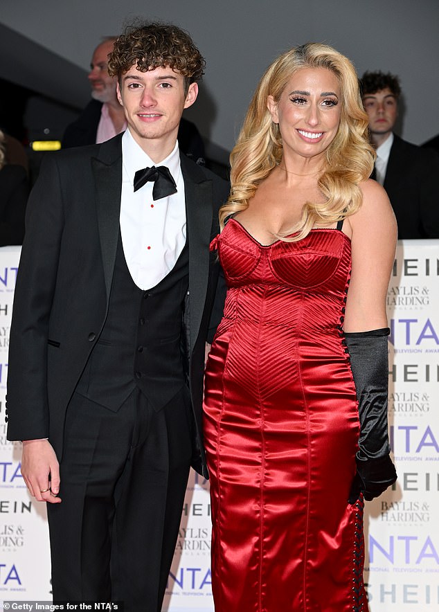 The star opted for a striking red number for the prestigious evening, as she posed for snaps on the red carpet with Zach, 16