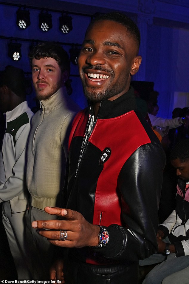 Rapper Dave opted for a stylish red and black leather jacket