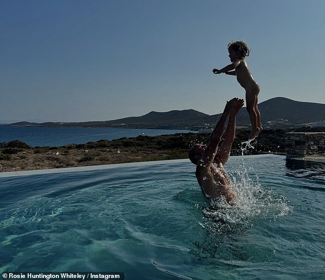 She posted this rare vacation snap of her fiancé Jason and their daughter Isabella, 2