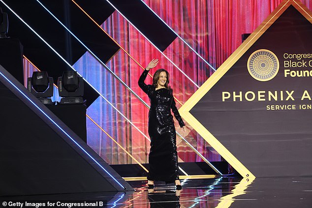 The Democratic candidate wore a long, black sequined dress as he addressed thousands at the Washington Convention Center