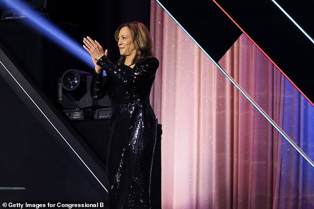 Vice President Kamala Harris ditched her Chuck Taylors and blazers for a flashy, sequined dress as she addressed the Congressional Black Caucus Foundation's Phoenix Awards Dinner