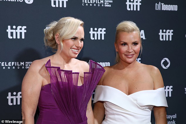 The couple, who announced their engagement in February last year, held each other sweetly during a photo call at the screening