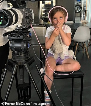 Six-year-old daughter Sunday, pictured on set, was consulted when she considered leaving the show