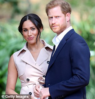 Prince Harry with Meghan Markle, who was an American divorcee when he met her