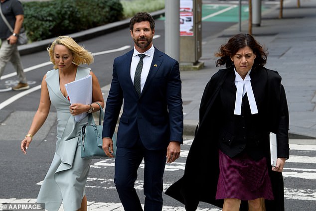 Former Special Forces Commando Heston Russell (pictured centre) with his lawyer Rebekah Giles (left) and barrister Sue Chrysanthou, SC (right)