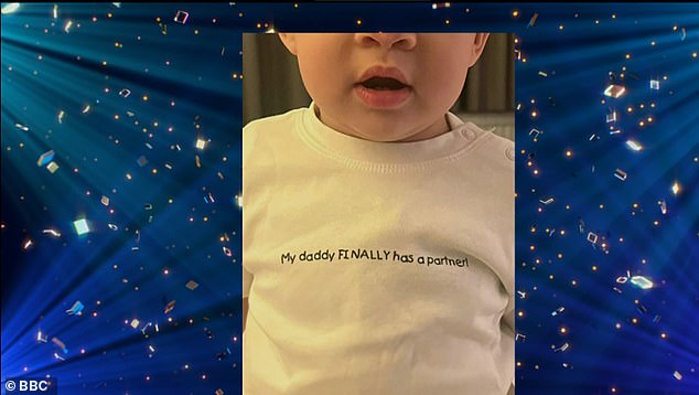 As she chatted with the couple on the couch, Claudia joked that Neil had his own merchandise line, before the cameras switched to a photo of Neil's 11-month-old daughter Havana wearing a babygrow with the words: 'My dad FINALLY has a partner'