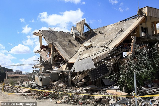 A building badly damaged by an Israeli strike last night stands in Kfar Rumman, near the southern Lebanese city of Nabatiyeh on September 14, 2024