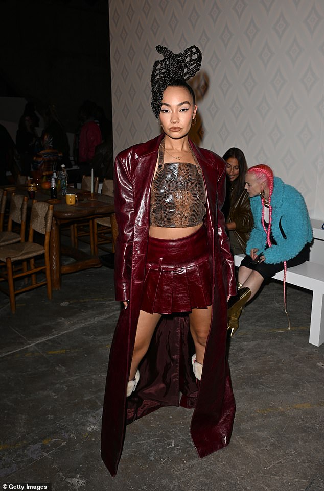 Elsewhere, Leigh-Anne, 32, made a fashion statement wearing a maroon leather co-ord and showing off her toned legs in a daring pleated mini skirt