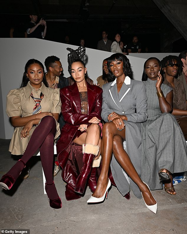 The former Little Mix star enjoyed the star-studded fashion show as she was snapped standing shoulder-to-shoulder with Kiki Osinbajo, Leigh-Anne Pinnock, AJ Odudu and Priscilla Anyabu