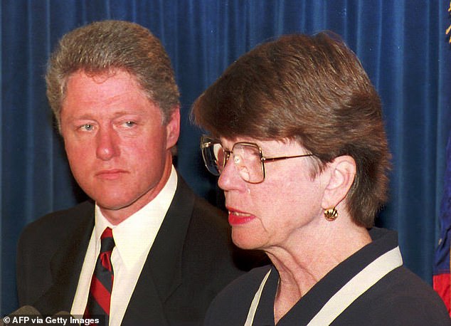 Reno and former President Bill Clinton are pictured during a press conference in July 1993