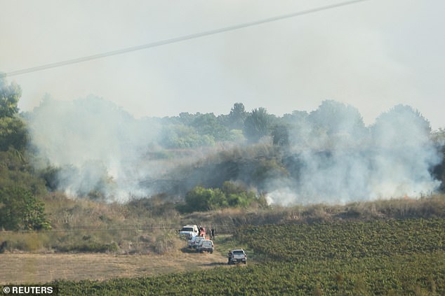 Smoke clouds after rocket attack from Yemen in central Israel