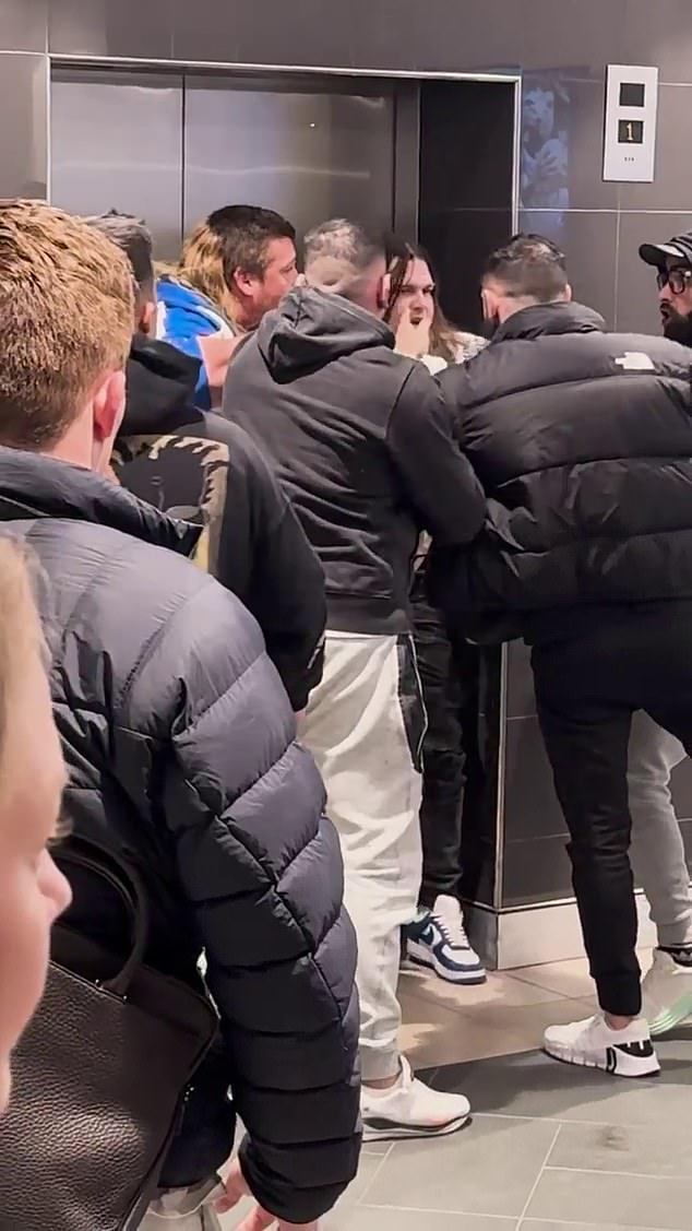 One man (third from right) appeared to have been punched in the face during the incident, leaving one man with what police described as 