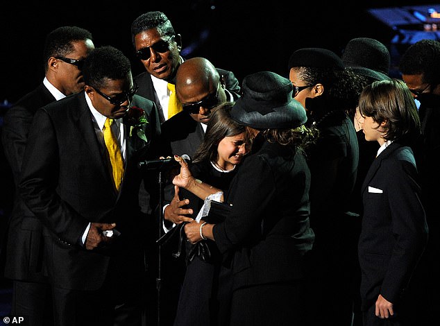 Tito is pictured with his brothers Marlon, Jermaine and Randy, and his sister Janet Jackson with Michael's children Paris and Prince during the pop icon's memorial series in 2009.