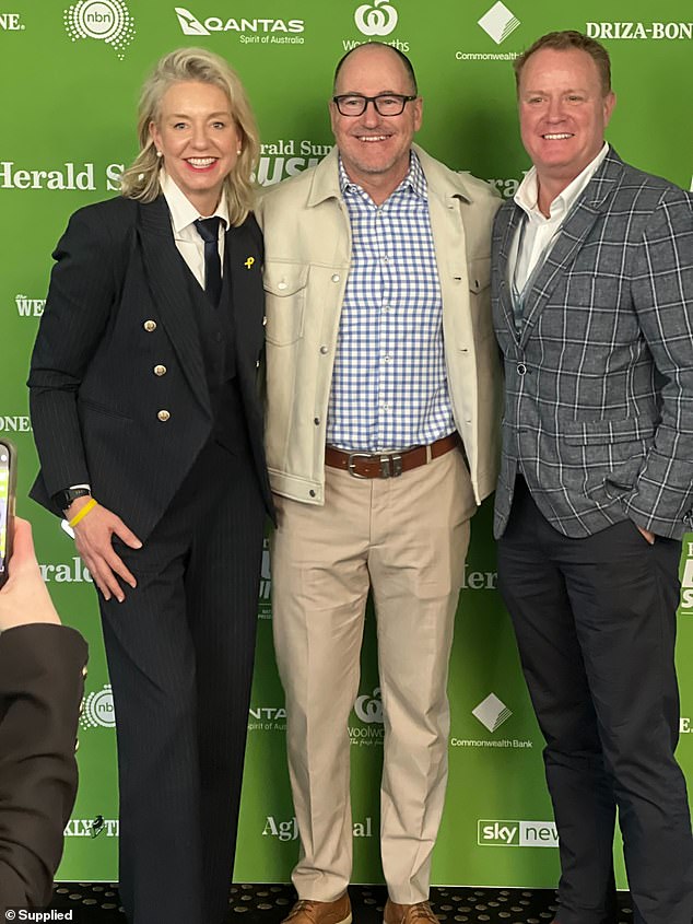 Bridget McKenzie, left, wore a three-piece suit to several events