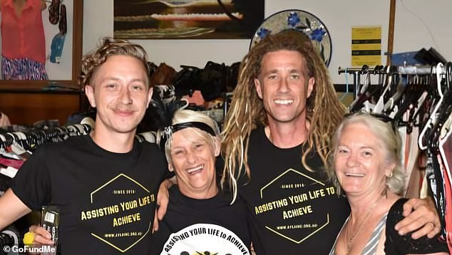 The shocking death of charity founder Scott Johnson (second from right) has left the local community shocked