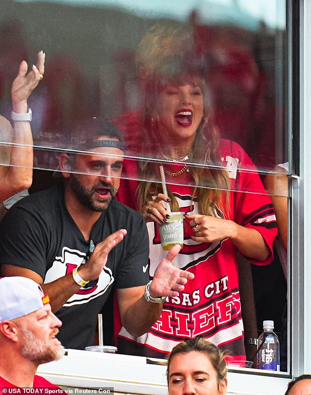 The singer was in high spirits as she cheered on her NFL star boyfriend to a win over the Cincinnati Bengals