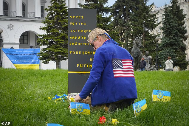 Ryan Wesley Routh pays tribute to foreign citizens killed during the Russo-Ukrainian war in a central square in Kiev, Ukraine, Saturday, April 30, 2022