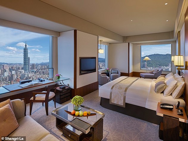 During his stay in Taipei, John stays at the Shangri-La, which has 'luxurious rooms with panoramic floor-to-ceiling views of the city and surrounding mountains'