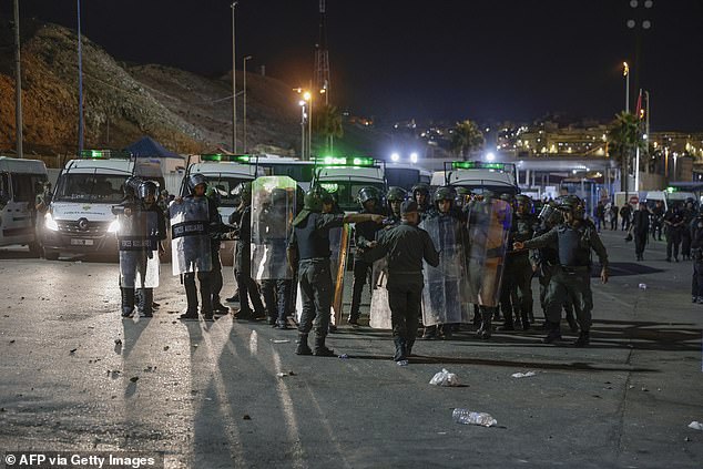 Moroccan police on August 16 pushed back hundreds of people who were heading towards the Spanish enclave of Ceuta