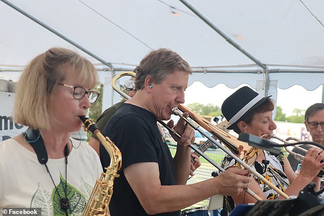 By using the trombone Rust played as a visual indicator, doctors were able to adjust the position of the wires and how much electrical current he had to use to keep his hand still. PICTURED: Rust playing with his dance band Six Thirty Sharp