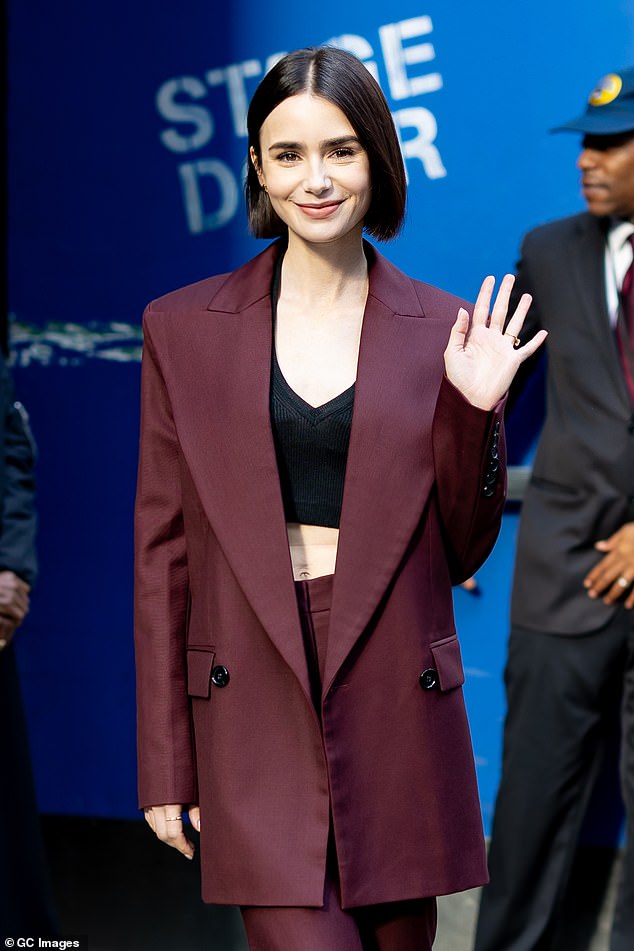 Later, she opted for an oversized suit, with a blazer that she wore open to show off her rock-hard abs as she arrived for a job interview in Times Square