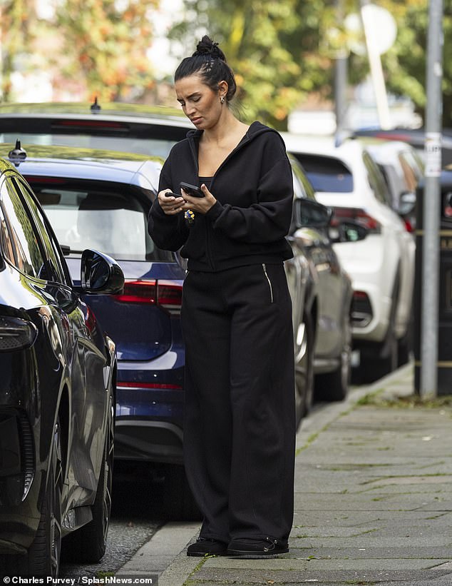 Annie, who pulled her dark locks back from her face in a messy bun, appeared makeup-free and undeterred by Lauryn's recent actions