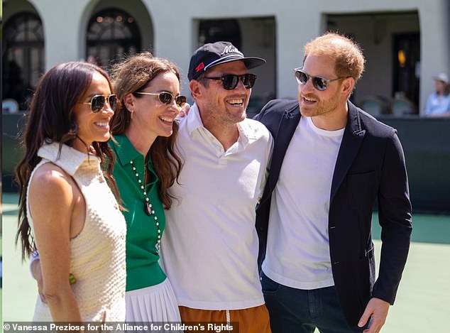 (From left) Meghan Markle, Kelly McKee Zajfen, her husband Julian and Prince Harry attend the George Zajfen Tennis Tournament in Los Angeles on Saturday, the day before the Duke's birthday.